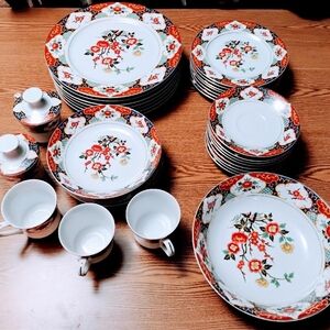 Elegant Floral Dinnerware Set with Red and White Design